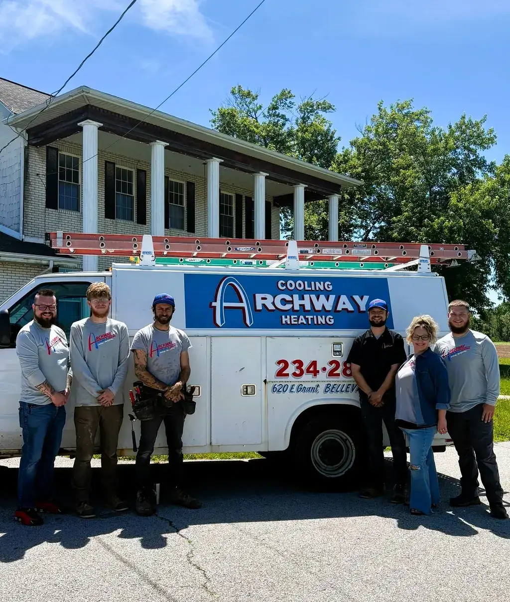The Archway Cooling & Heating crew standing in front of a branded service van in Belleville